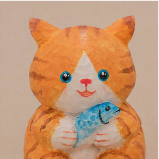 Cat Holding a Fish